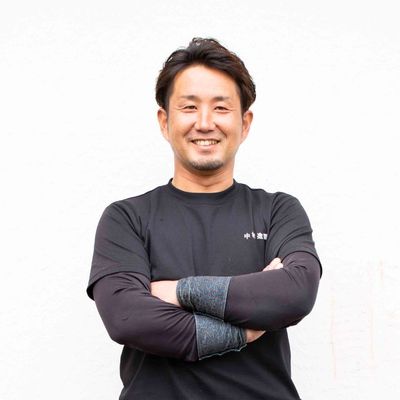 中村造園代表の笑顔の写真